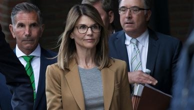 Lori Loughlin and Mossimo Giannulli are shown making a court appearance. (Credit: Shutterstock)