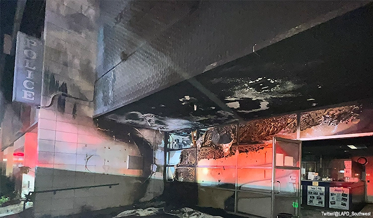 The LAPD says a woman pushed a burning shopping cart inside a police station setting the lobby on fire. (Credit: Twitter/@LAPD_Southwest)