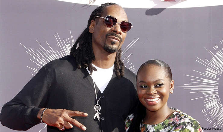 Snoop Dogg and Cori Broadus at the 2014 MTV Video Music Awards held at the Forum in Los Angeles on August 24, 2014 in Los Angeles, California. Credit: PopularImages — Photo by Popular Images/Deposit Photos