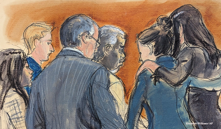 Sean ' Diddy' Combs defense team surrounds him as they discuss the jury note regarding a verdict on counts two, three, four and five, in Manhattan federal court, Tuesday, July 1, 2025, in New York. (Elizabeth Williams/AP)