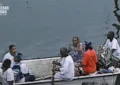 New Orleans residents escape the flood waters brought by Hurricane Katrina in August 2005, in this screen grab from "Hurricane Katrina: Race Against Time." (Credit: National Geographic)