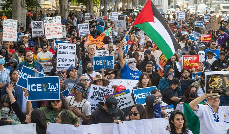 Community organizers protest outside the Federal Building following an immigration enforcement operation by federal authorities on Friday, June 6, 2025, in Los Angeles. (Credit: Shutterstock)
