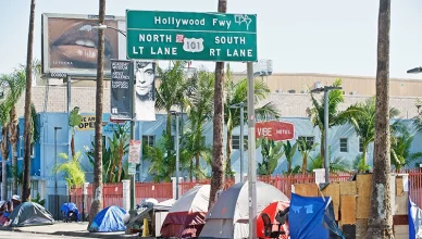 HOLLYWOOD CALIFORNIA - FEB. 26, 2022: Homeless encampment along the roadside depicting the ever growing epidemic of homelessness. Los Angeles. (Credit: Shutterstock)