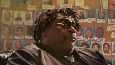 A composite image of BMF co-founder Terry Flenory and a police board from season 2 of “The BMF Documentary: Blowing Money Fast” (Credit: Starz)