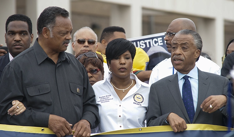 Jesse Jackson, Roslyn Brock, and Al Sharpton marches towards the Sanford Police department in support of Trayvon Martin. March 31, 2012 in Sanford Florida. (Credit: Shutterstock)