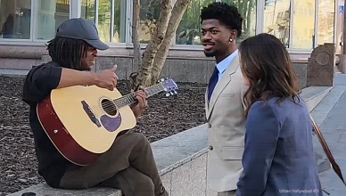 Thursday, March 12, 2026. Van Nuys, Los Angeles, California. Street musician Jensen Pawley played a song for Lil Nas X and his attorney Christy O’Connor outside the Van Nuys Courthouse in Los Angeles. (Credit: Anita Bennett/Urban Hollywood 411)