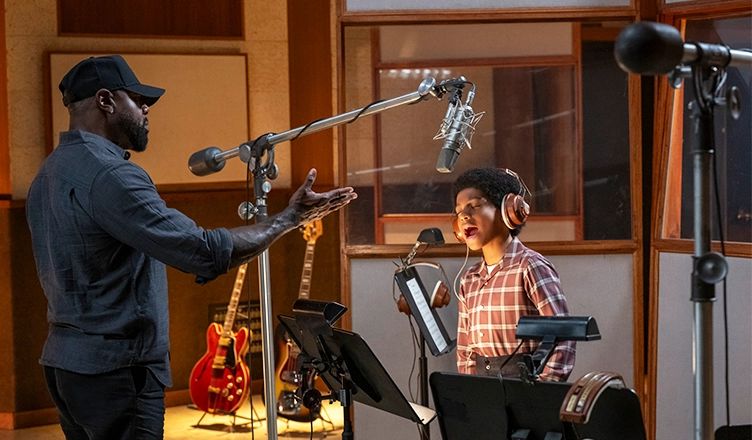 Director Antoine Fuqua and Juliano Valdi as Young Michael in Michael. Photo Credit: Glen Wilson/Lionsgate