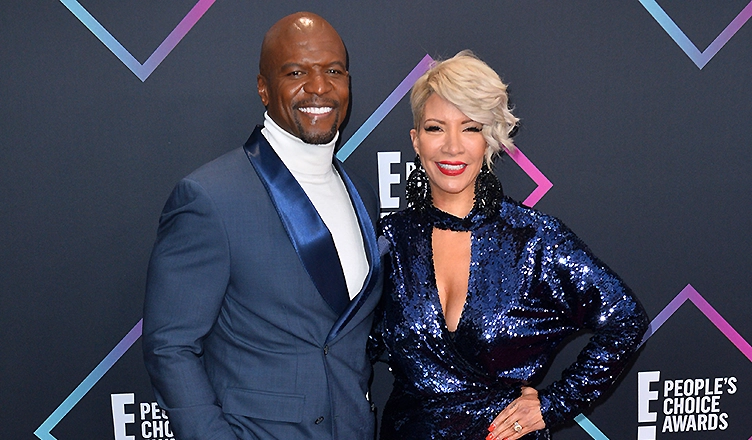 Terry Crews & Rebecca King-Crews at the E! People's Choice Awards 2018 at Barker Hangar, Santa Monica Airport — Photo by Feature Flash