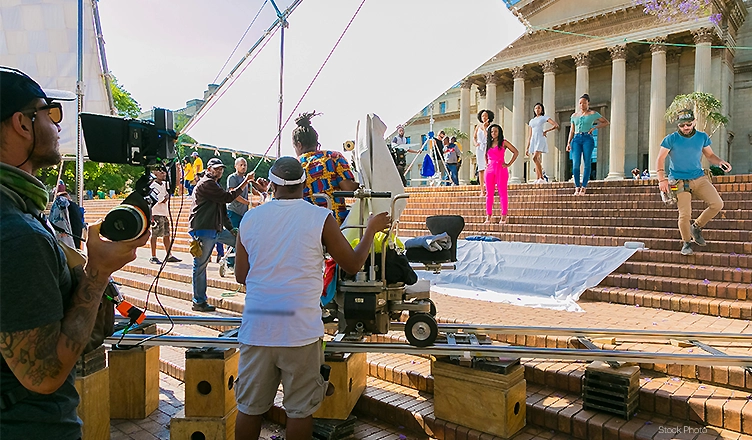 October 09 2018: Behind the scenes of a Television advert Film Set on location at a University Campus — Stock Photo by Sunshine Seeds