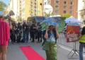 Protesters held a "resistance red carpet" event outside the Met Gala in New York City on Monday, May 4, 2026. (Credit: YouTube/FreedomNews.TV) Strike a Pose Outside Met Gala 2026