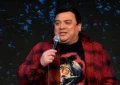 Carlos Mencia performs a stand-up comedy set. (Credit: YouTube)