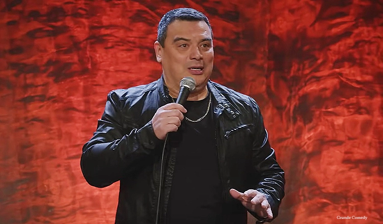 Comedian Carlos Mencia is shown in a screengrab from his " Here I Am" stand-up special. (Credit: YouTube/Grande Comedy)(
