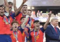 President Donald Trump lingered on the stage with Spain's national football at the 2026 World Cup trophy ceremony team on Sunday, July 19, 2026. (Credit: YouTube/The Financial Express)
