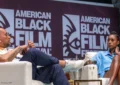 Kenya Barris and Issa Rae speak at ABFF. (Credit: Aaron J. Thornton for ABFF)