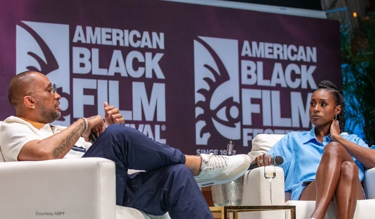 Kenya Barris and Issa Rae speak at ABFF. (Credit: Aaron J. Thornton for ABFF)