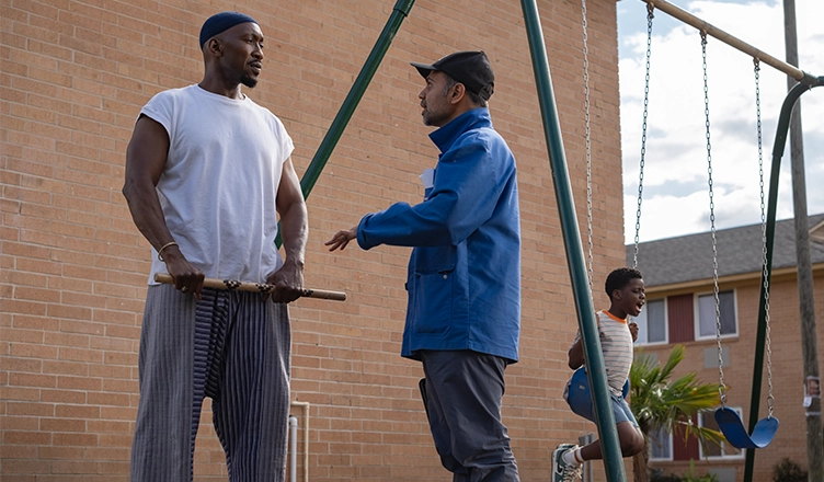 Mahershala Ali, director Bassam Tariq, and actor Jahleel Kamara on the set of Your Mother Your Mother Your Mother. (Credit: Jaclyn Martinez/ Amazon MGM Studios)