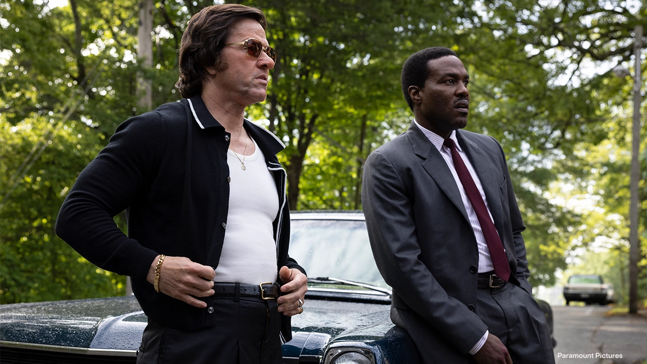 Mark Wahlberg, left, and Yahya Abdul-Mateen II star in By Any Means. (Credit: Paramount Pictures)