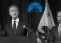 Sacramento, CA - Feb 1, 2023: Governor Gavin Newsom speaking at a Gun Safety Legislation Press Conference as Rob Bonta looks on, with an inset of the Paramount logo (Credit: Shutterstock/Paramount)