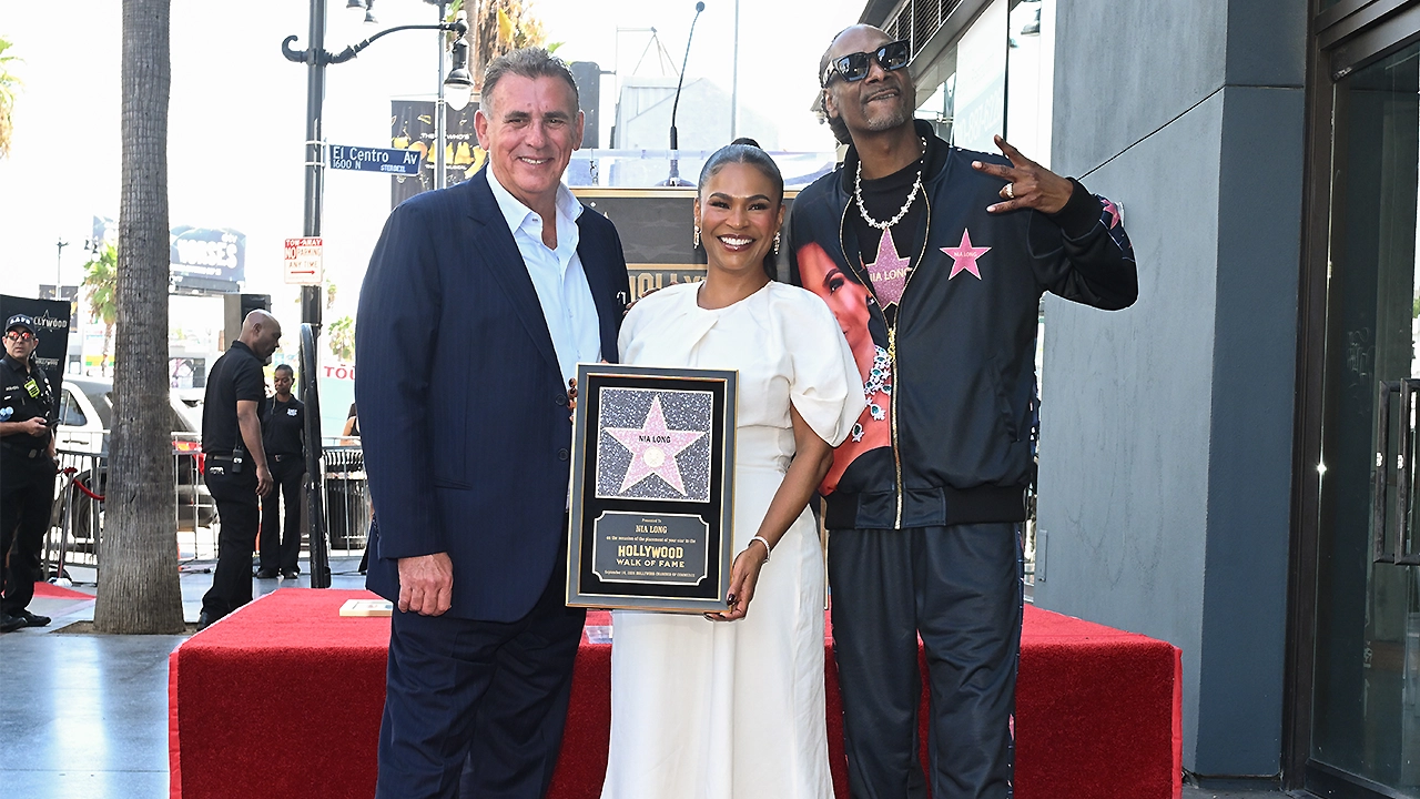 Graham King, Nia Long and Snoop Dogg attend Nia Long Hollywood’s walk of fame star ceremony on September 16, 2026 in Hollywood, California. (Photo by Vivien Killilea/Getty Images for Lionsgate)
