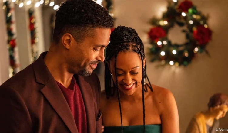 Tia Mowry and Henderson Wade star in CHRISTMAS FROM THE HEART (Credit: Lifetime)