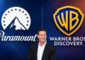 David Ellison With Paramount and Warner Bros Logo