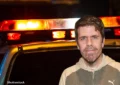 Perez Hilton is shown in front of squad car (Credit: Shutterstock)