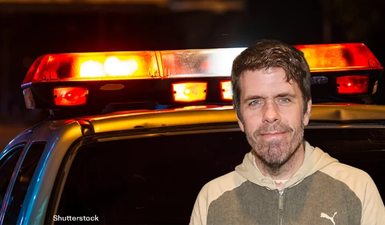 Perez Hilton is shown in front of squad car (Credit: Shutterstock)